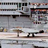 Requin jet fighter about to takeoff from SCS Constitution. Note the Navy's motto : Ut Stervia cadit / ita orbis terrae.