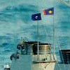 SCS Juichon at sea, showing the flag